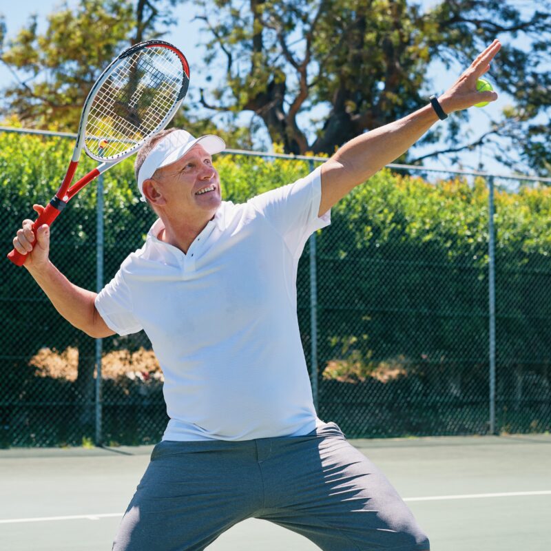 man returning to tennis after recovering from tennis elbow with shockwave therapy at Bawtry, Lincoln and Newark.